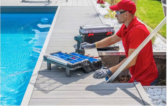 Man installing a pool autofill system